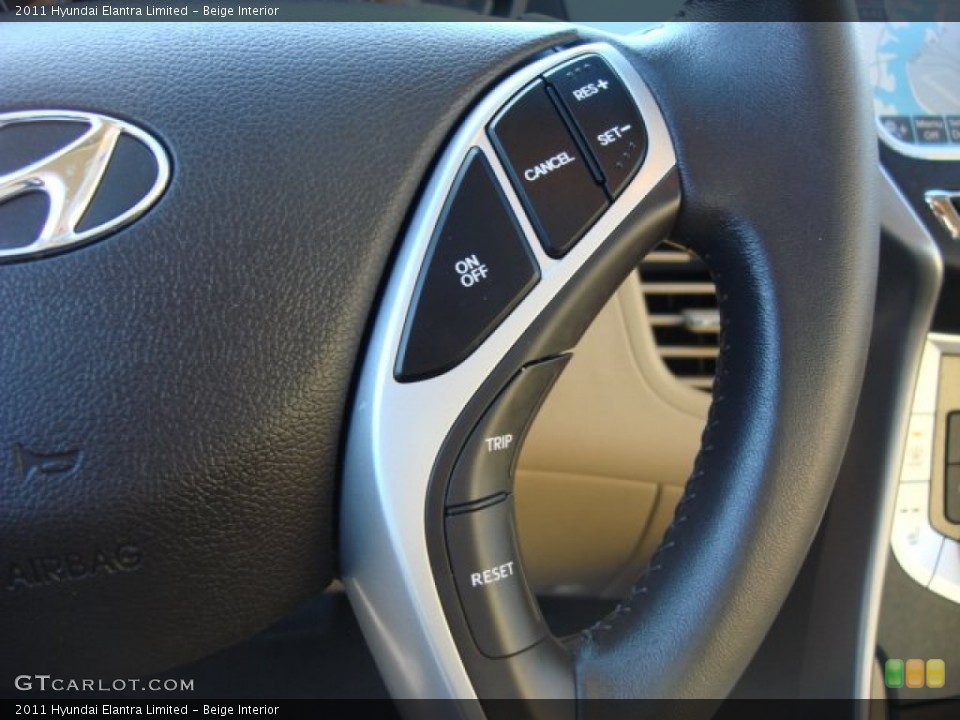 Beige Interior Controls for the 2011 Hyundai Elantra Limited #55991611