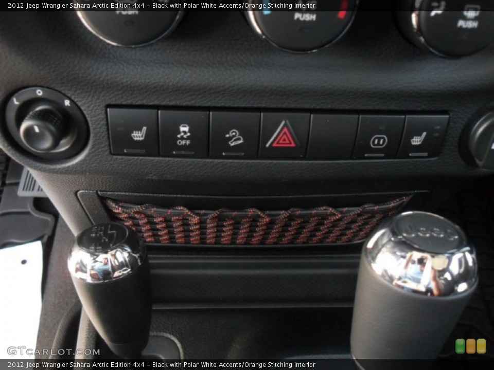 Black with Polar White Accents/Orange Stitching Interior Controls for the 2012 Jeep Wrangler Sahara Arctic Edition 4x4 #56003592