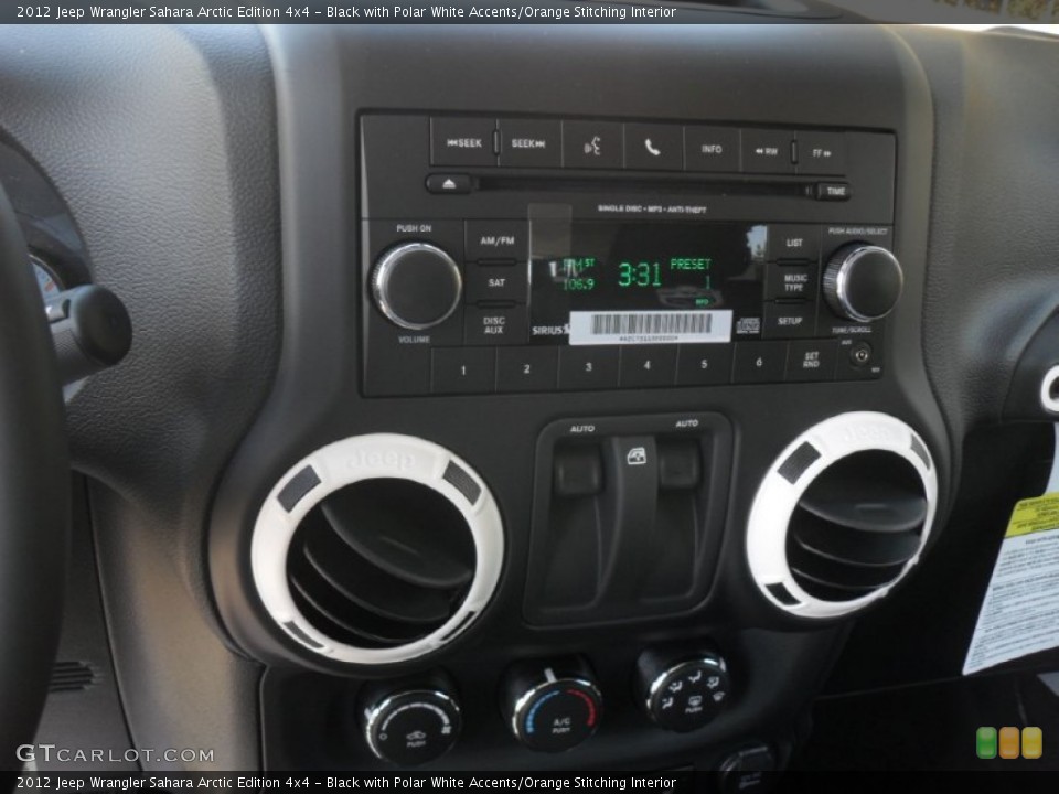 Black with Polar White Accents/Orange Stitching Interior Audio System for the 2012 Jeep Wrangler Sahara Arctic Edition 4x4 #56003599