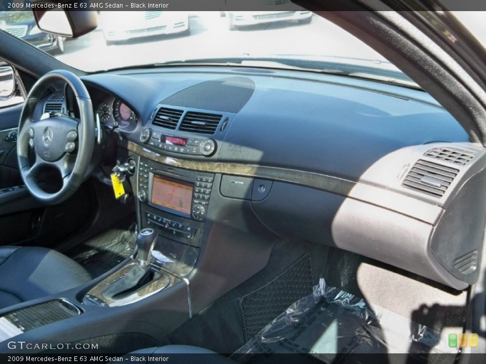 Black Interior Dashboard for the 2009 Mercedes-Benz E 63 AMG Sedan #56043860