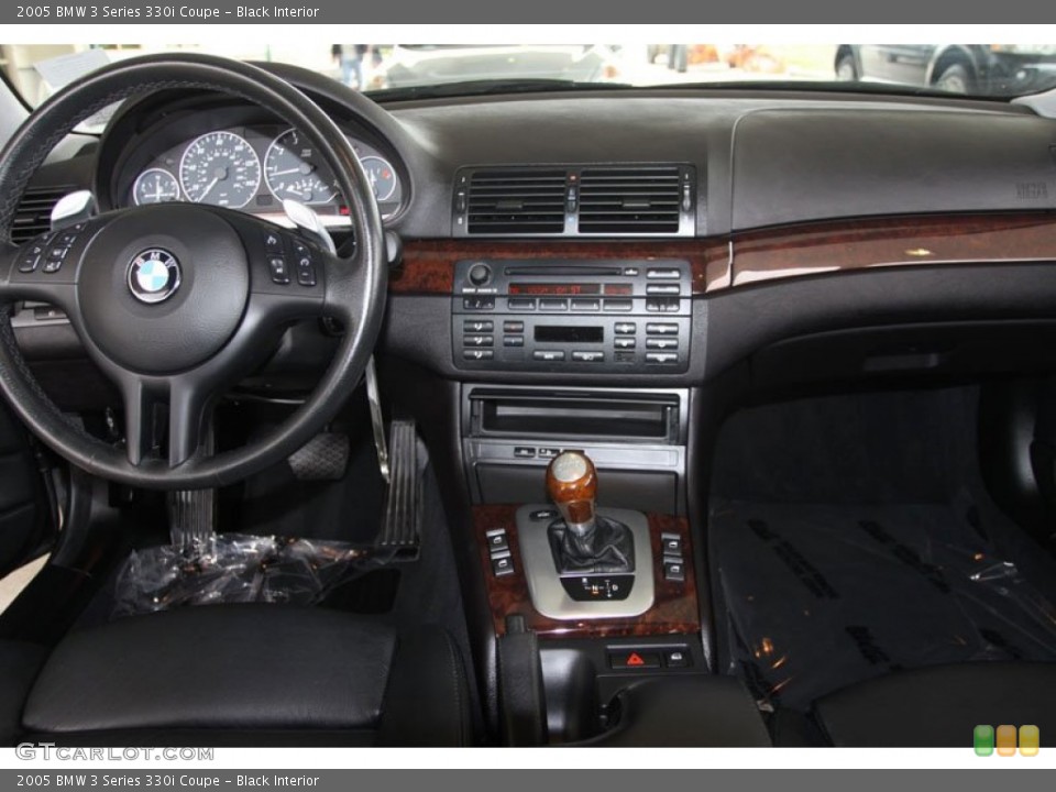 Black Interior Dashboard for the 2005 BMW 3 Series 330i Coupe #56049359