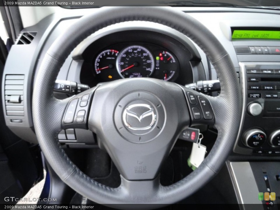 Black Interior Steering Wheel for the 2009 Mazda MAZDA5 Grand Touring #56053616