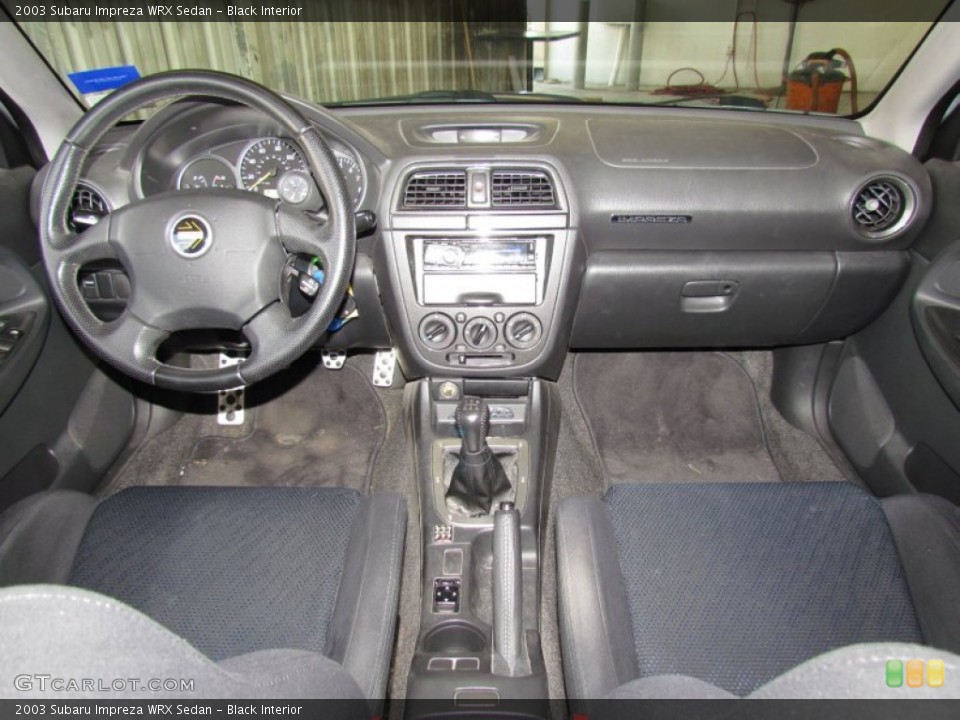 Black Interior Dashboard for the 2003 Subaru Impreza WRX Sedan #56073260