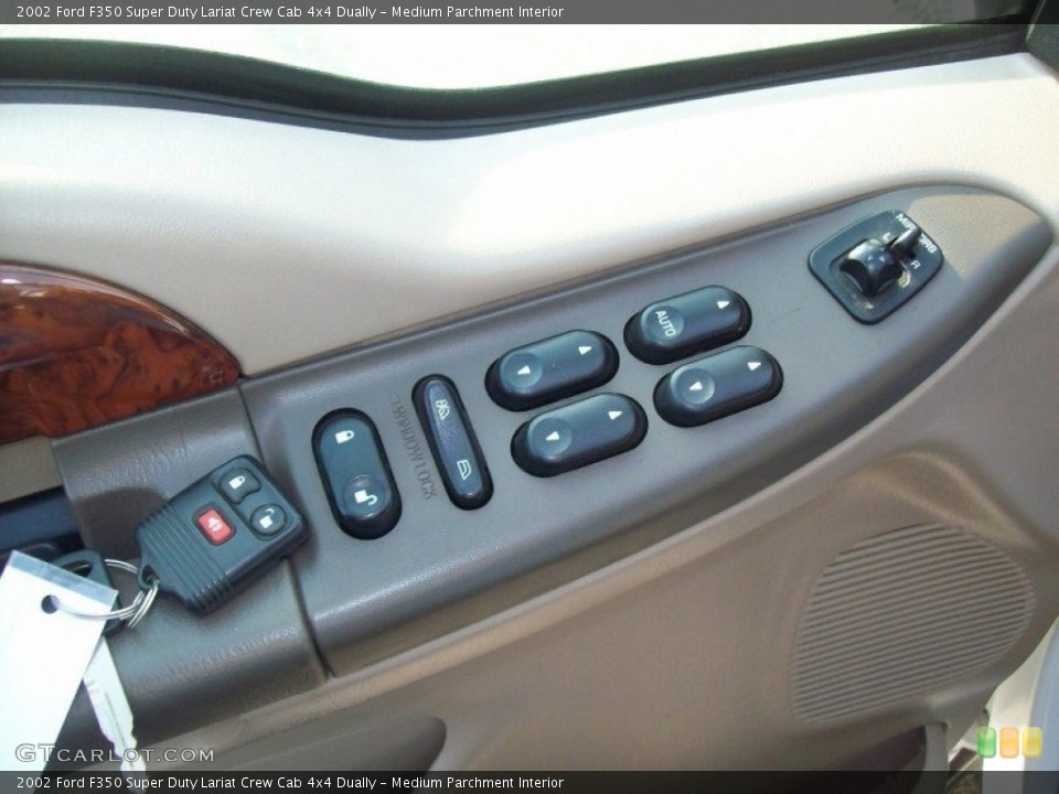 Medium Parchment Interior Controls for the 2002 Ford F350 Super Duty Lariat Crew Cab 4x4 Dually #56078090