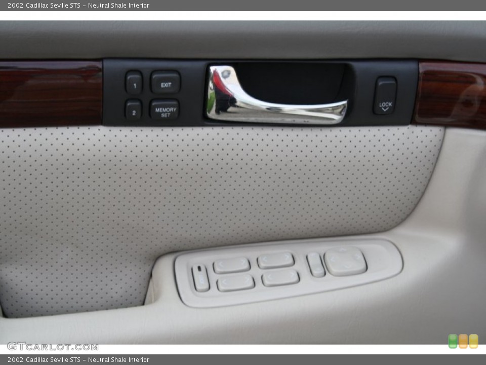 Neutral Shale Interior Controls for the 2002 Cadillac Seville STS #56091323