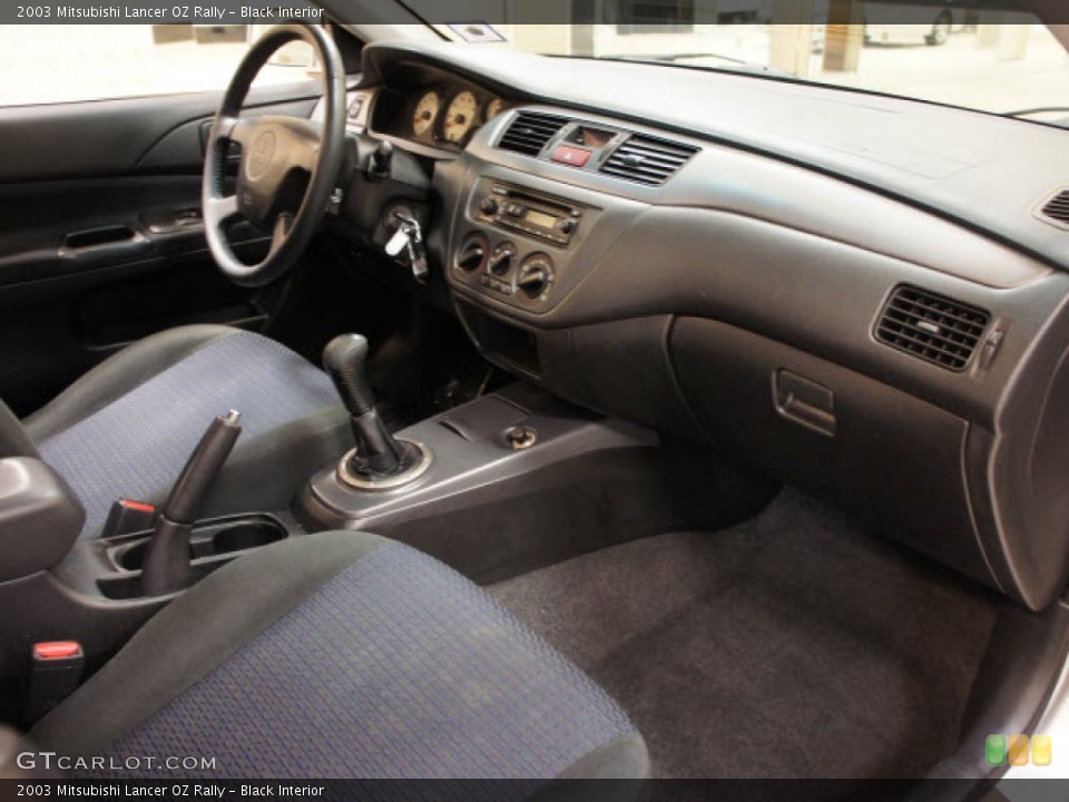 Black Interior Dashboard for the 2003 Mitsubishi Lancer OZ Rally #56093075