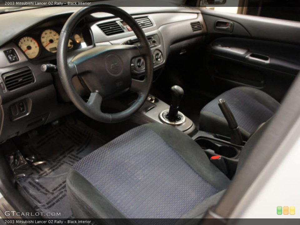 Black Interior Prime Interior for the 2003 Mitsubishi Lancer OZ Rally #56093087