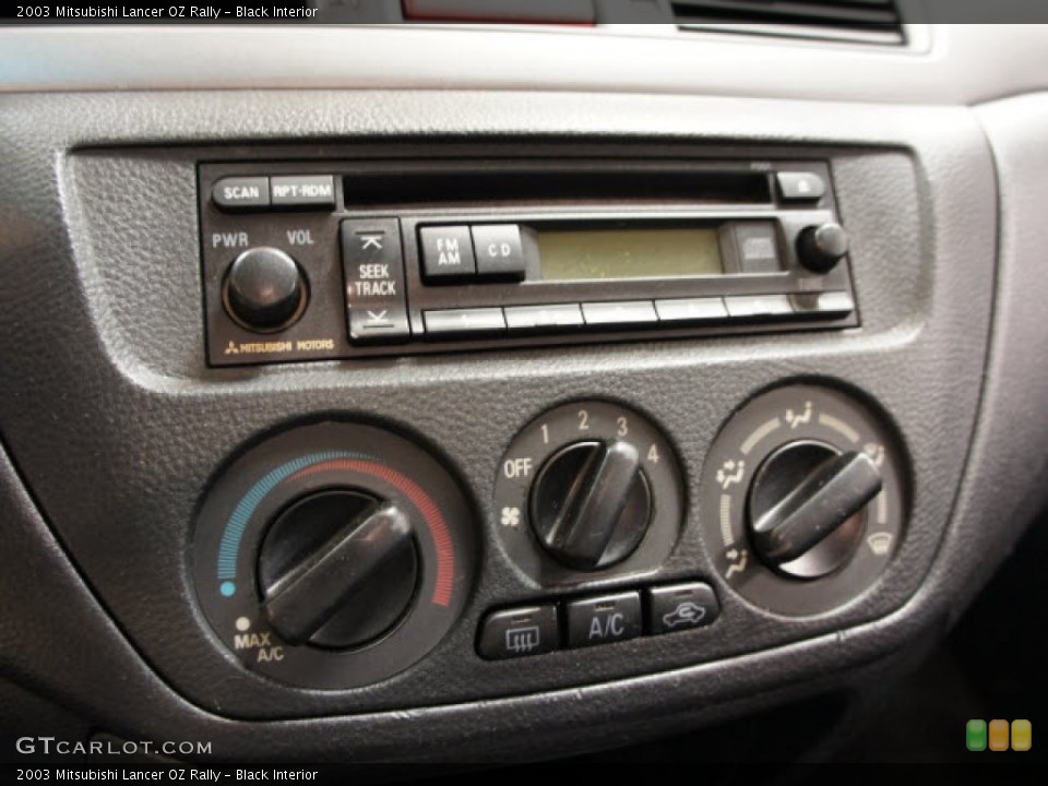 Black Interior Controls for the 2003 Mitsubishi Lancer OZ Rally #56093132