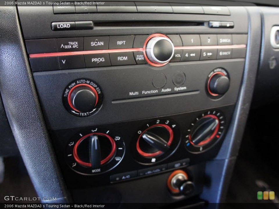 Black/Red Interior Controls for the 2006 Mazda MAZDA3 s Touring Sedan #56109431