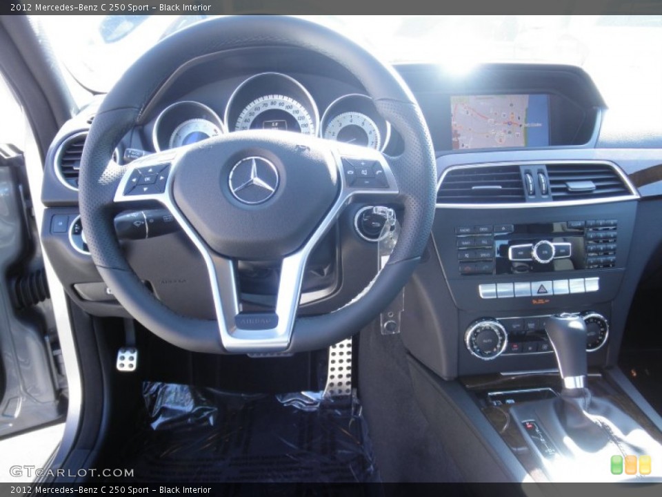 Black Interior Dashboard for the 2012 Mercedes-Benz C 250 Sport #56119185