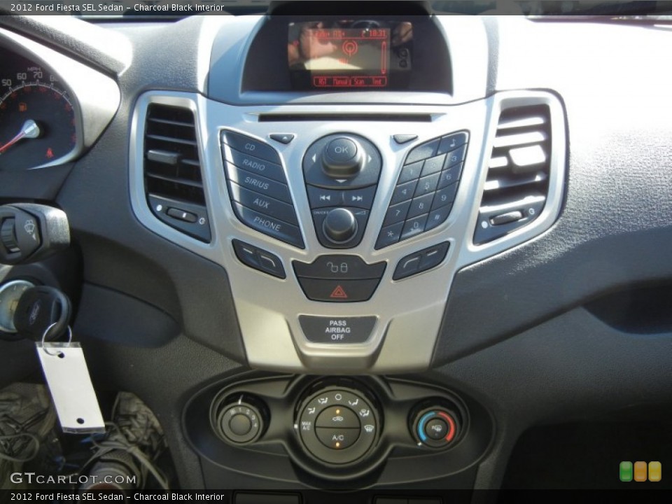Charcoal Black Interior Controls for the 2012 Ford Fiesta SEL Sedan #56125760