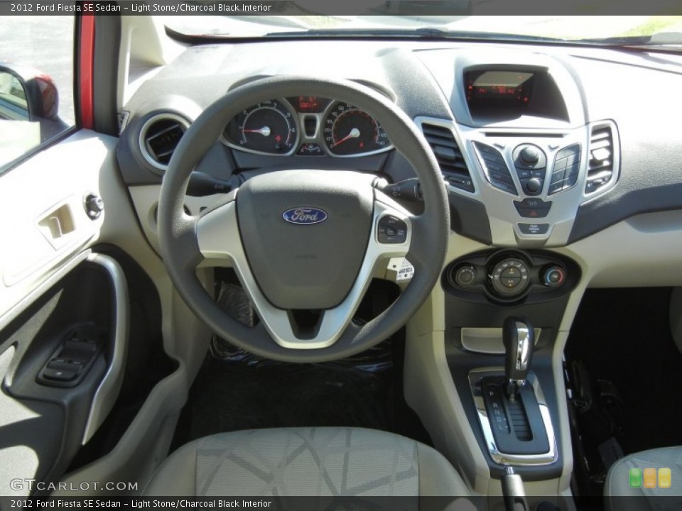 Light Stone/Charcoal Black Interior Dashboard for the 2012 Ford Fiesta SE Sedan #56125814