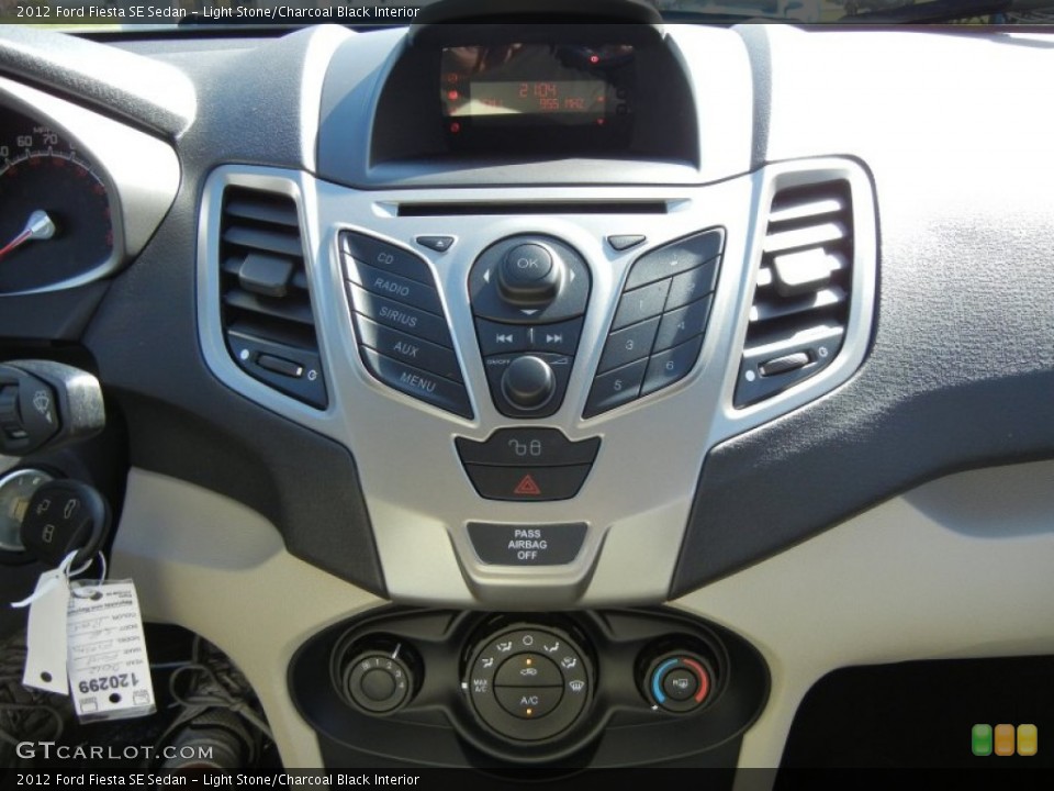 Light Stone/Charcoal Black Interior Controls for the 2012 Ford Fiesta SE Sedan #56125865