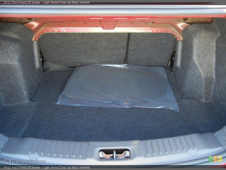 Light Stone/Charcoal Black Interior Trunk for the 2012 Ford Fiesta SE Sedan #56125871