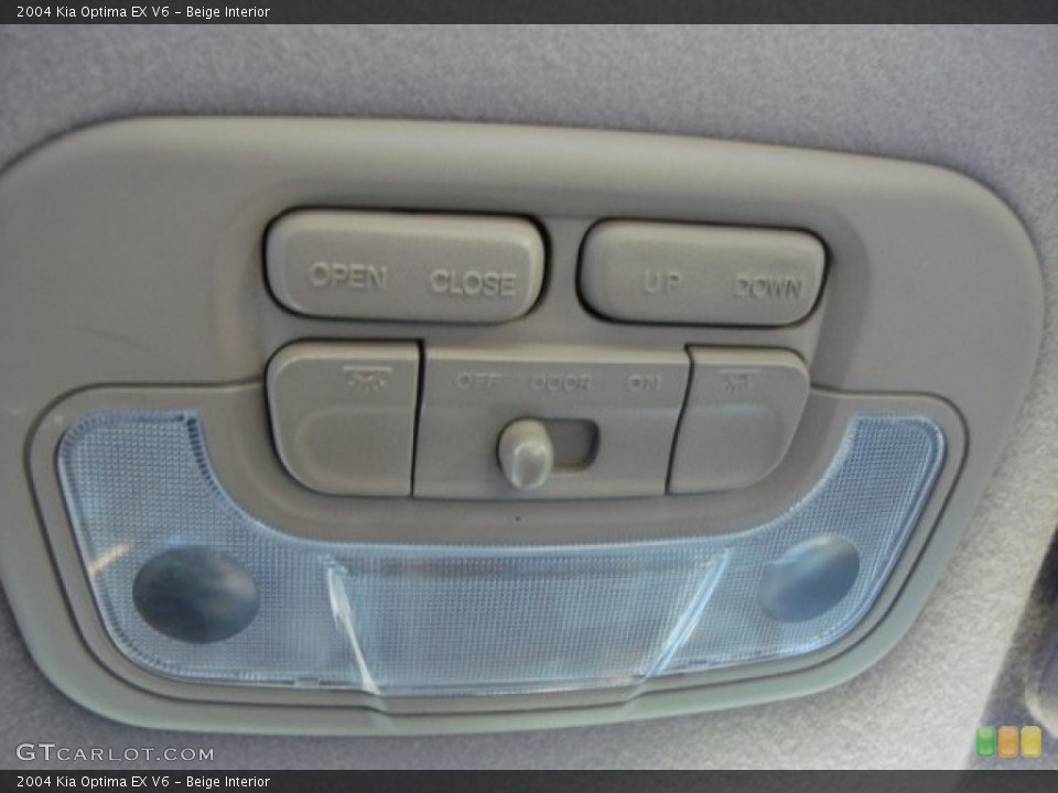 Beige Interior Controls for the 2004 Kia Optima EX V6 #56151986