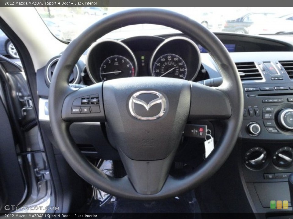 Black Interior Steering Wheel for the 2012 Mazda MAZDA3 i Sport 4 Door #56199737