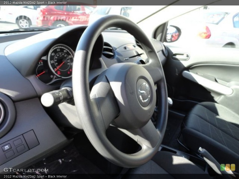 Black Interior Steering Wheel for the 2012 Mazda MAZDA2 Sport #56200913