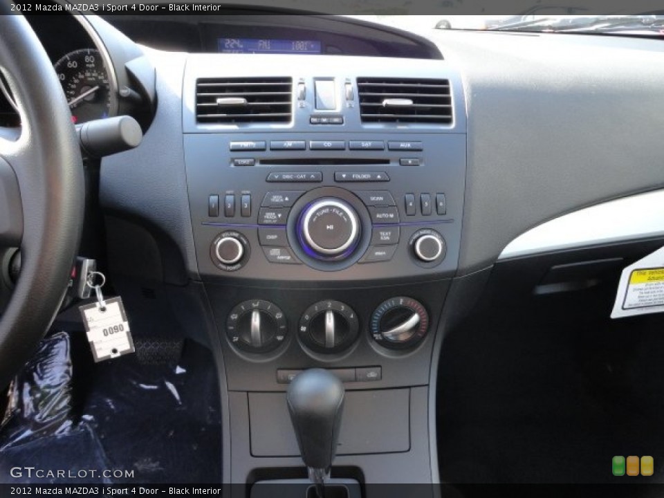 Black Interior Controls for the 2012 Mazda MAZDA3 i Sport 4 Door #56253923
