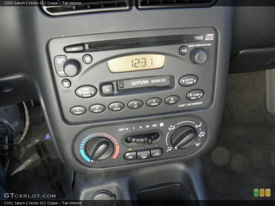 Tan Interior Controls for the 2002 Saturn S Series SC2 Coupe #56260469