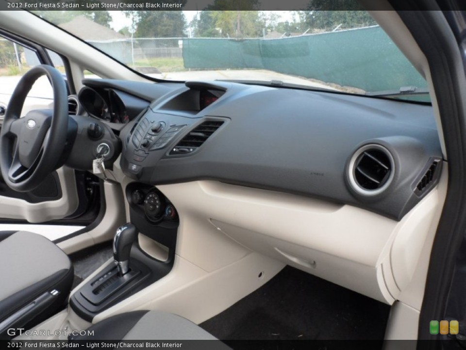 Light Stone/Charcoal Black Interior Dashboard for the 2012 Ford Fiesta S Sedan #56272457