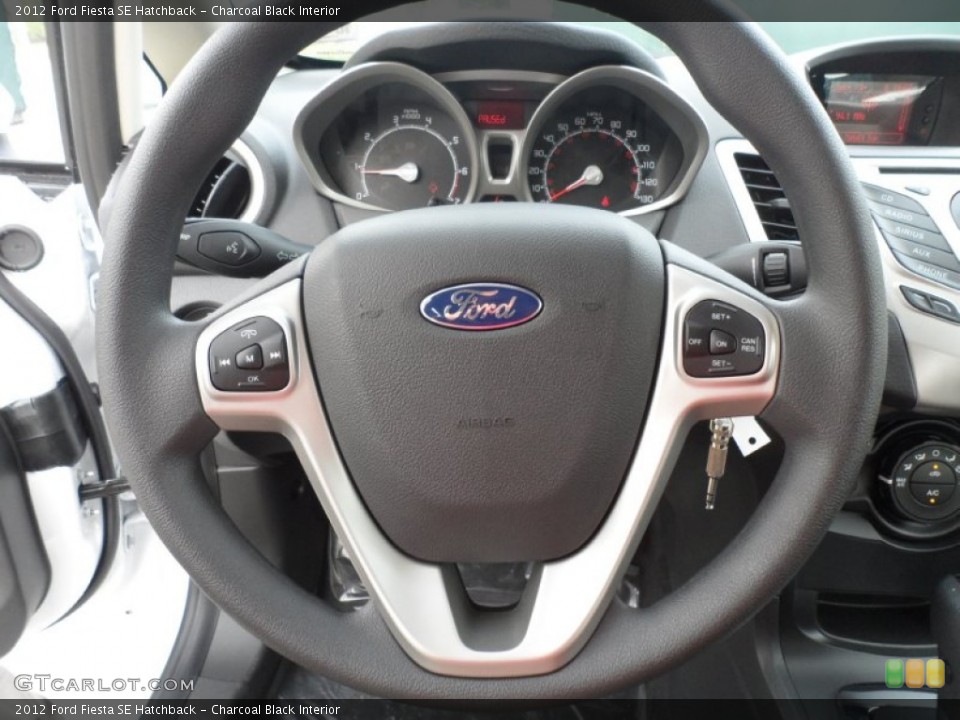 Charcoal Black Interior Steering Wheel for the 2012 Ford Fiesta SE Hatchback #56272748