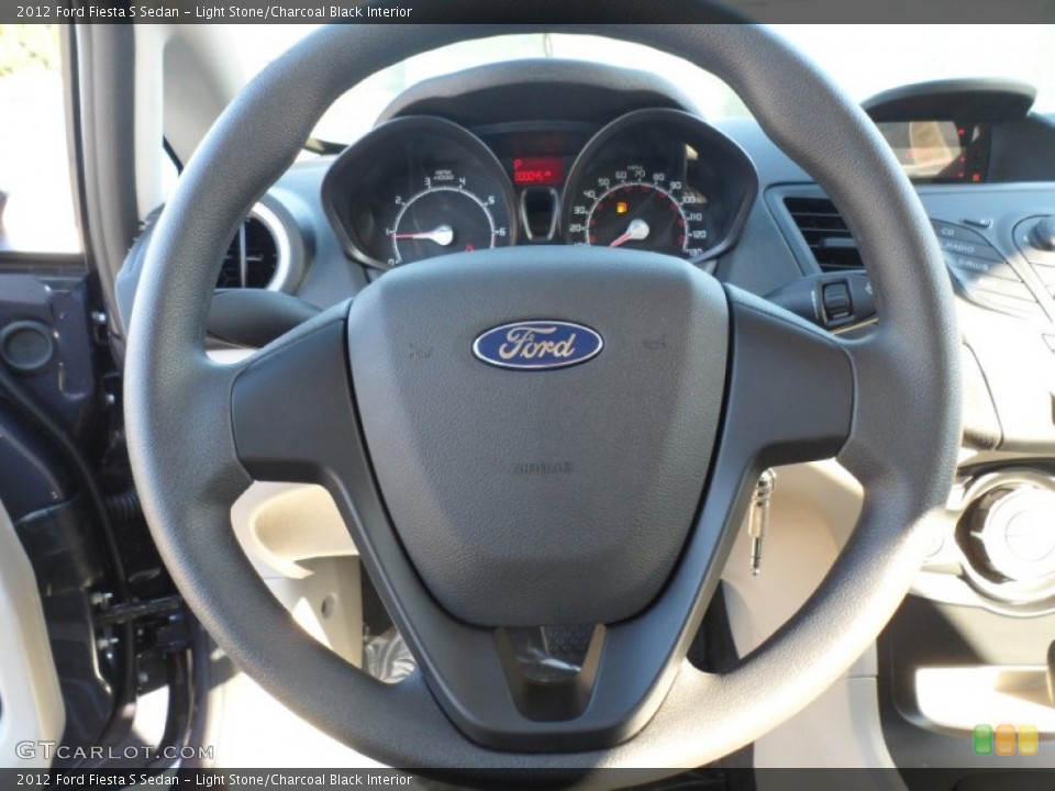 Light Stone/Charcoal Black Interior Steering Wheel for the 2012 Ford Fiesta S Sedan #56279610