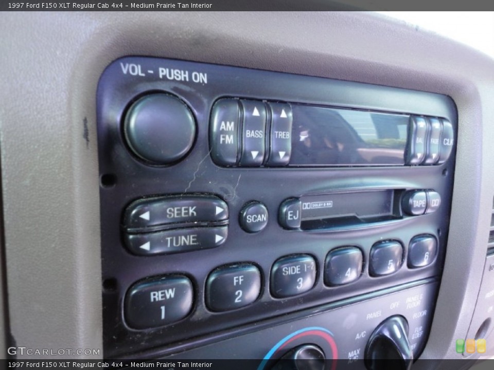 Medium Prairie Tan Interior Audio System for the 1997 Ford F150 XLT Regular Cab 4x4 #56293962