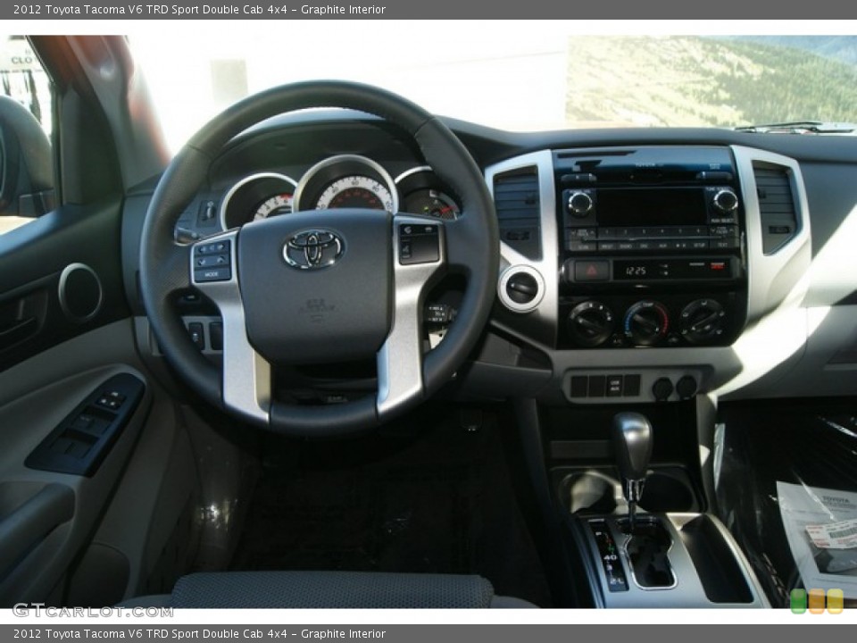 Graphite Interior Dashboard for the 2012 Toyota Tacoma V6 TRD Sport Double Cab 4x4 #56387284