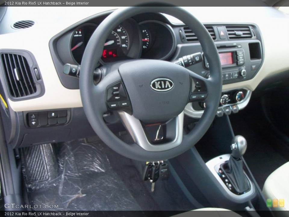 Beige Interior Dashboard for the 2012 Kia Rio Rio5 LX Hatchback #56387530