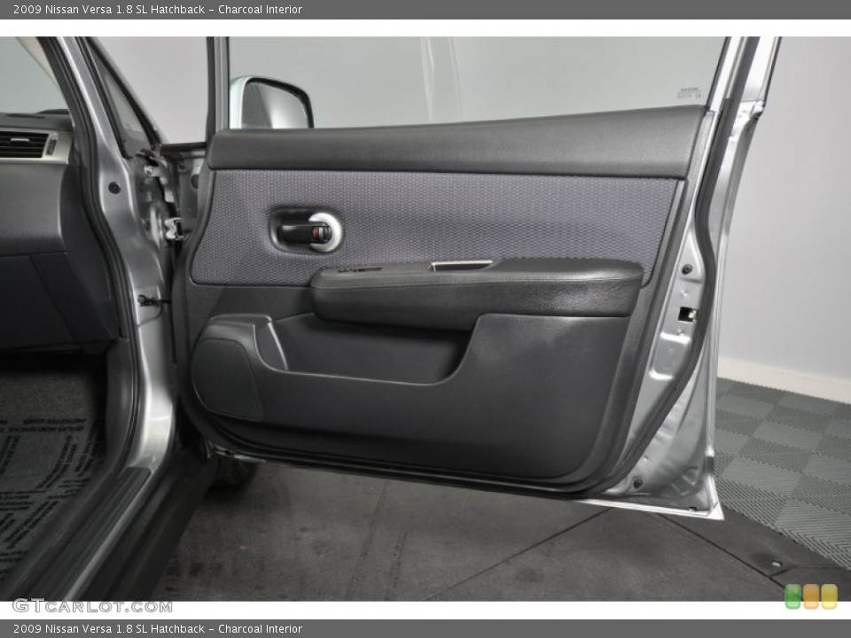 Charcoal Interior Door Panel for the 2009 Nissan Versa 1.8 SL Hatchback #56424748