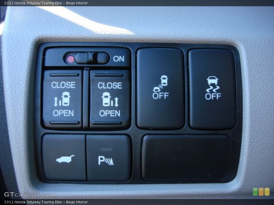Beige Interior Controls for the 2011 Honda Odyssey Touring Elite #56448515