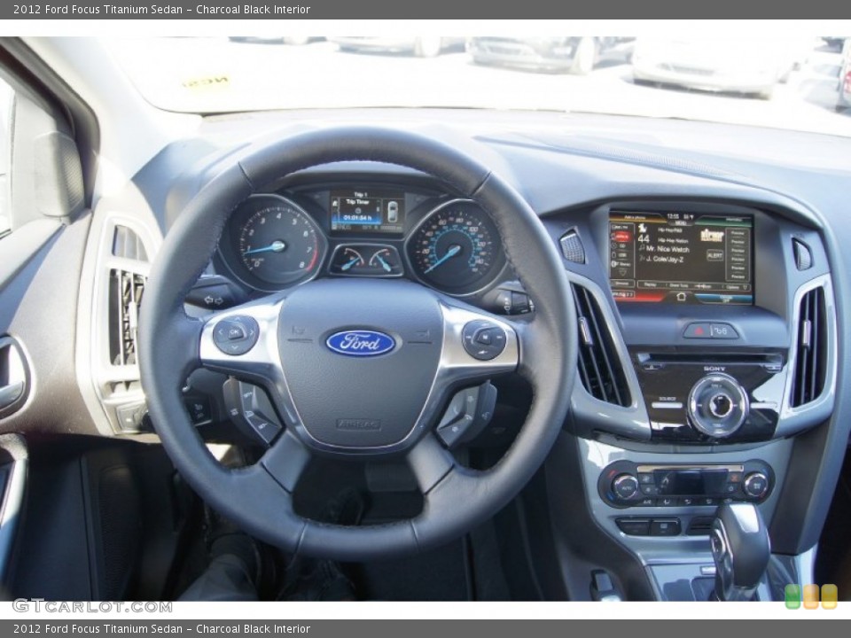 Charcoal Black Interior Dashboard for the 2012 Ford Focus Titanium Sedan #56471786