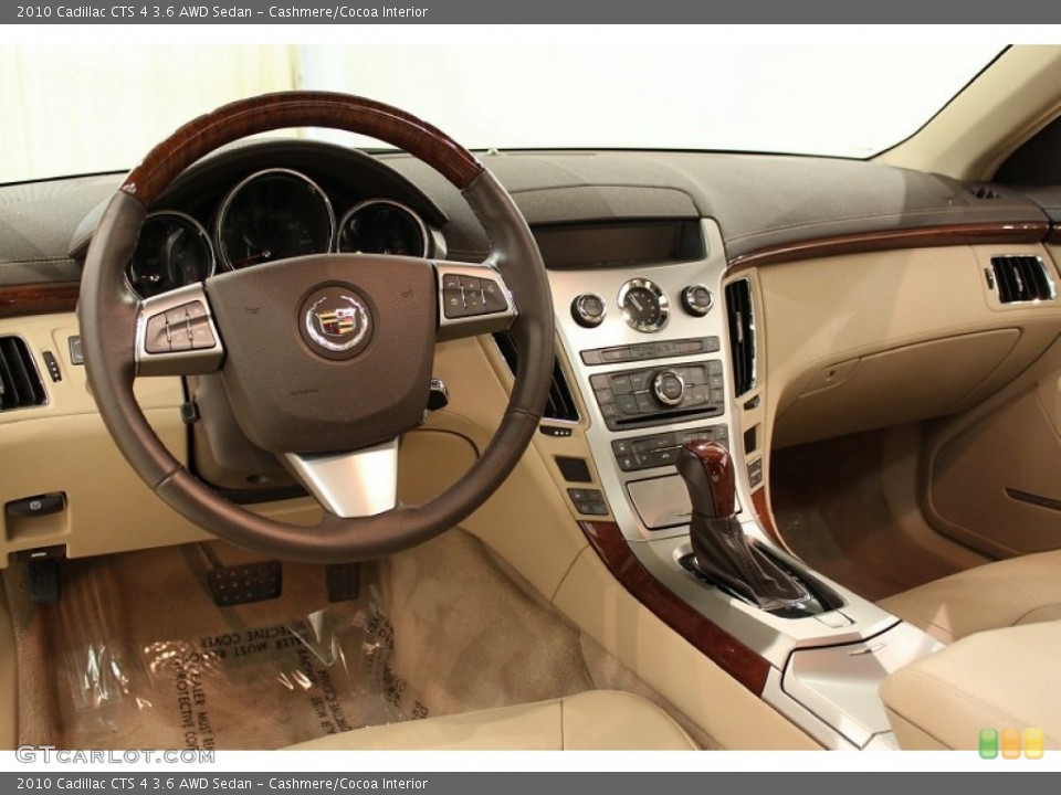 Cashmere/Cocoa Interior Dashboard for the 2010 Cadillac CTS 4 3.6 AWD Sedan #56514994