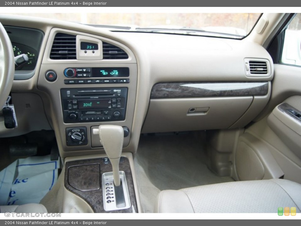 Beige Interior Dashboard for the 2004 Nissan Pathfinder LE Platinum 4x4 #56566404