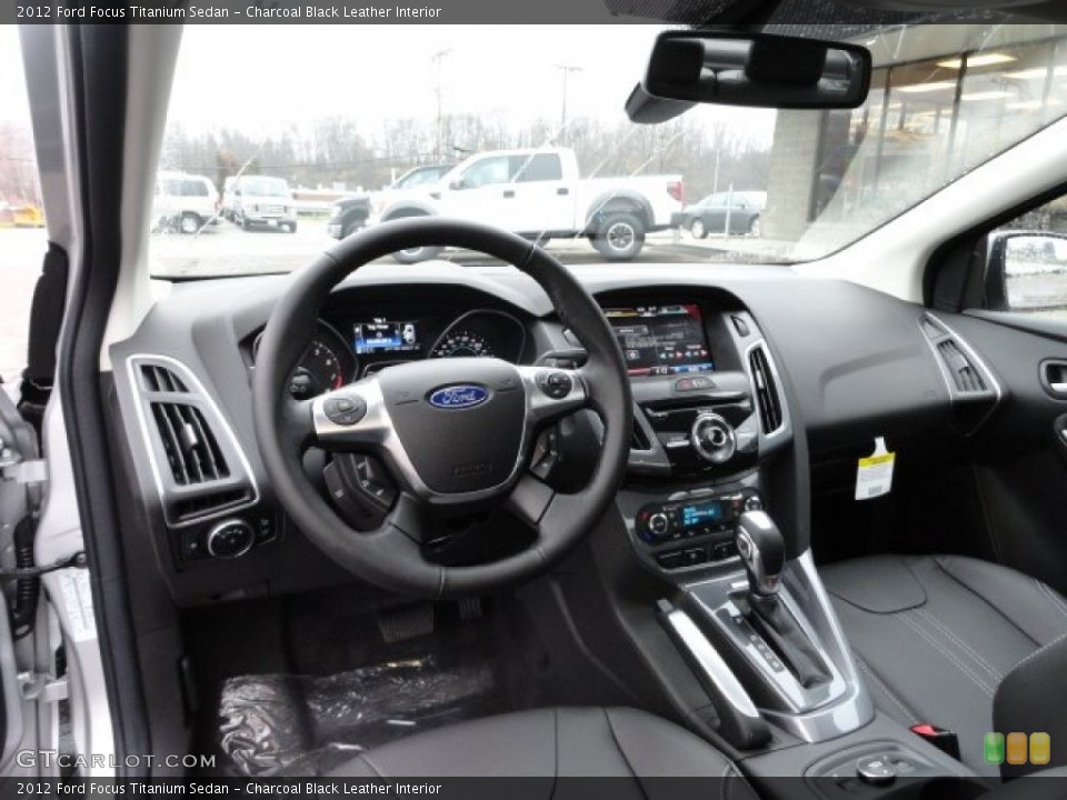 Charcoal Black Leather Interior Dashboard for the 2012 Ford Focus Titanium Sedan #56590008