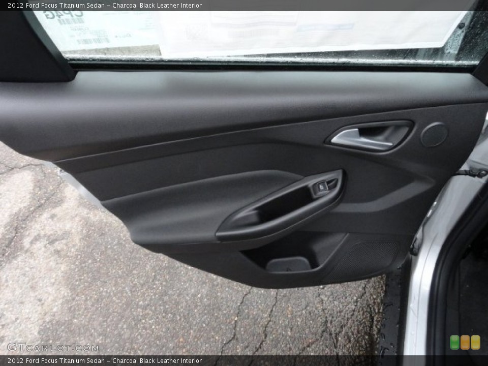 Charcoal Black Leather Interior Door Panel for the 2012 Ford Focus Titanium Sedan #56590017