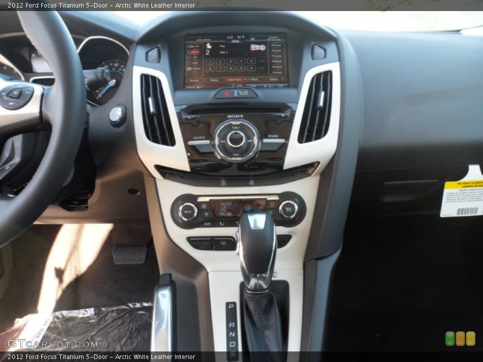 Arctic White Leather Interior Controls for the 2012 Ford Focus Titanium 5-Door #56604333