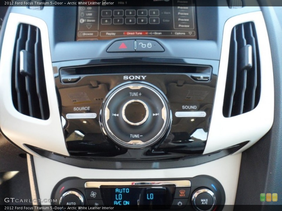 Arctic White Leather Interior Controls for the 2012 Ford Focus Titanium 5-Door #56604345