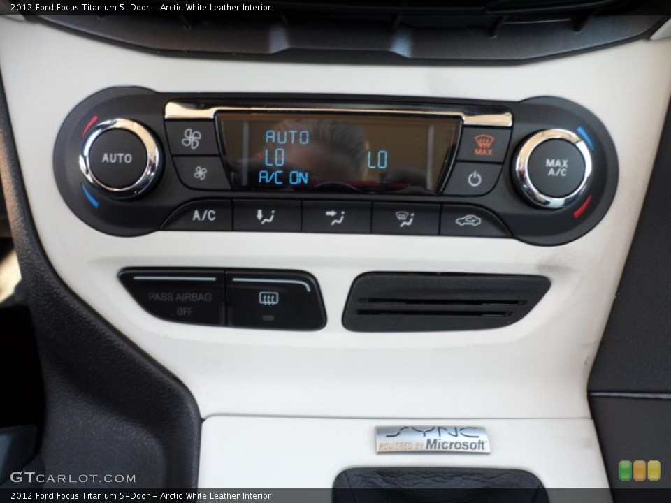 Arctic White Leather Interior Controls for the 2012 Ford Focus Titanium 5-Door #56604351