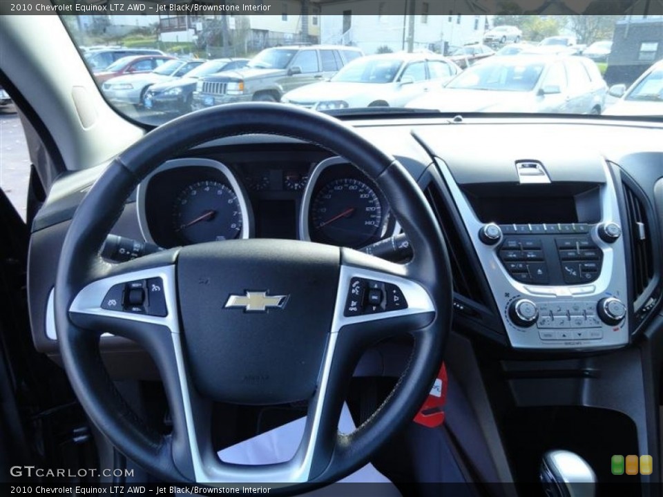 Jet Black/Brownstone Interior Steering Wheel for the 2010 Chevrolet Equinox LTZ AWD #56661384