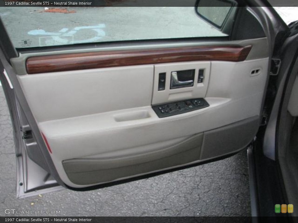 Neutral Shale Interior Door Panel for the 1997 Cadillac Seville STS #56668107