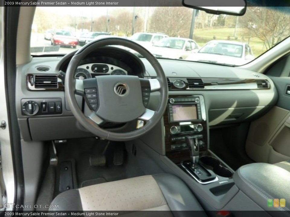 Medium Light Stone Interior Dashboard for the 2009 Mercury Sable Premier Sedan #56710721