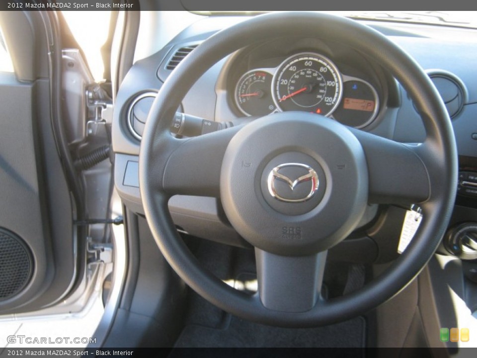 Black Interior Steering Wheel for the 2012 Mazda MAZDA2 Sport #56712248