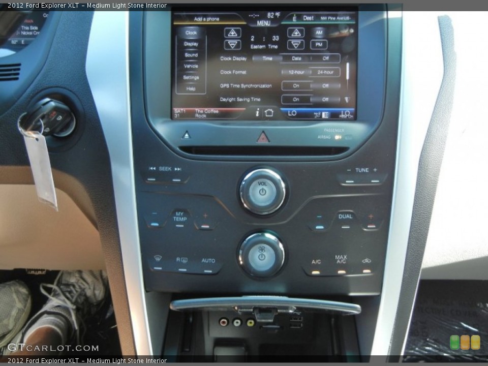 Medium Light Stone Interior Controls for the 2012 Ford Explorer XLT #56712938