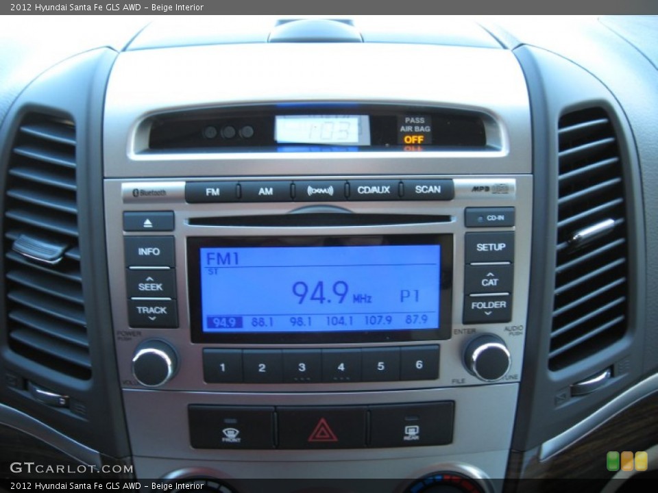Beige Interior Audio System for the 2012 Hyundai Santa Fe GLS AWD #56727698
