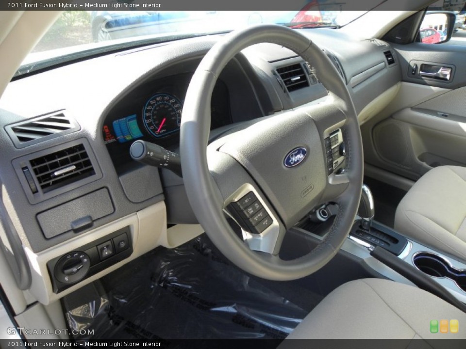 Medium Light Stone Interior Steering Wheel for the 2011 Ford Fusion Hybrid #56731927