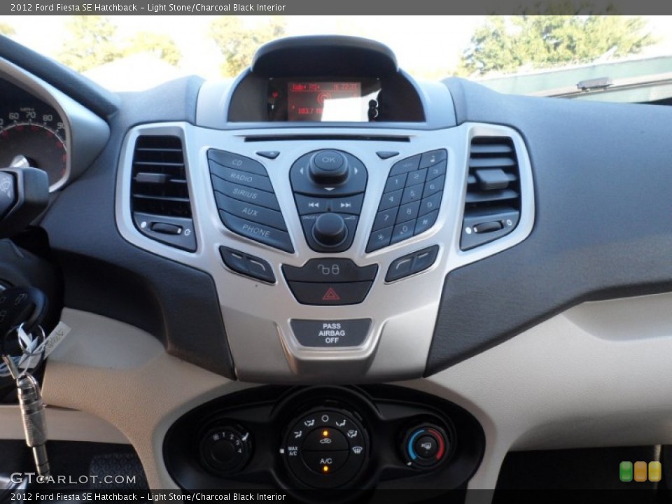 Light Stone/Charcoal Black Interior Controls for the 2012 Ford Fiesta SE Hatchback #56745093
