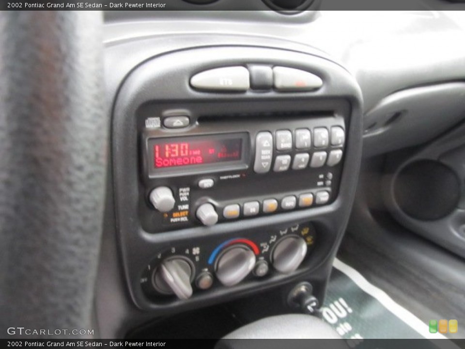 Dark Pewter Interior Controls for the 2002 Pontiac Grand Am SE Sedan #56793046