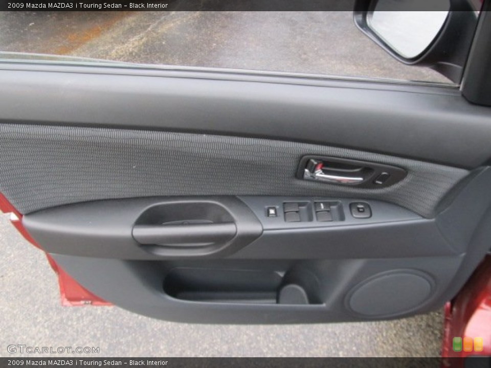 Black Interior Door Panel for the 2009 Mazda MAZDA3 i Touring Sedan #56793900