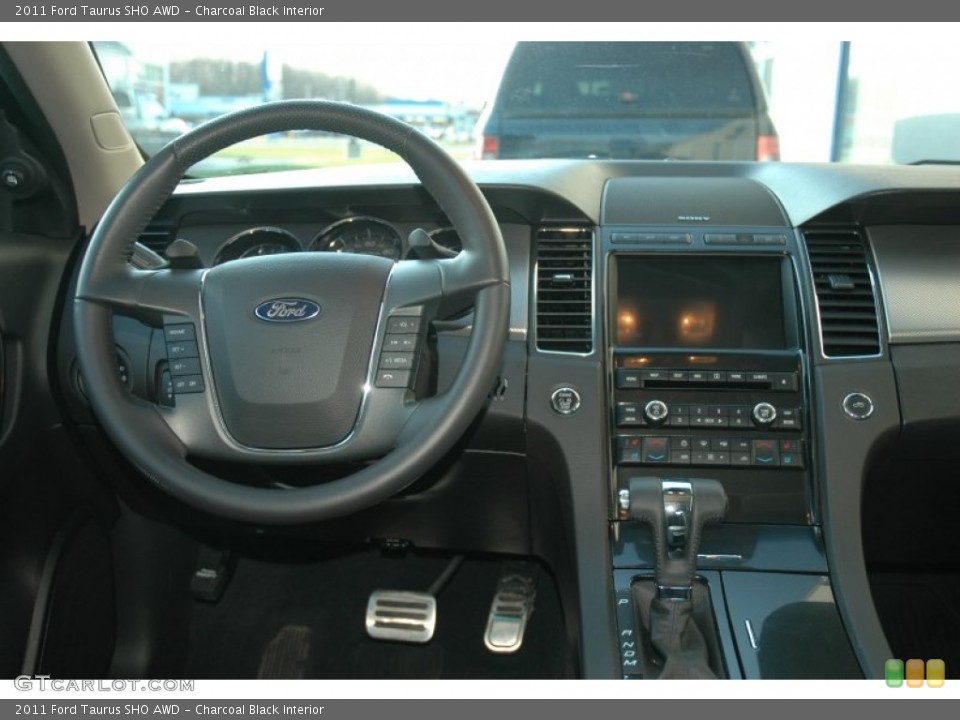 Charcoal Black Interior Dashboard for the 2011 Ford Taurus SHO AWD #56806964